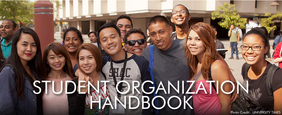 Students assembled with the words Student Organization Handbook