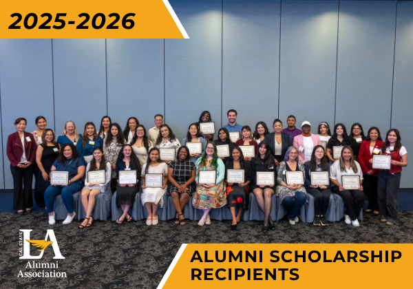 Group of 40 scholarship recipients smiling and posing with their certificates. Text reads 2025-26 Alumni scholarship recipients