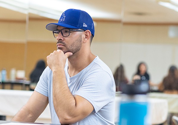 Student wearing a Dodgers cap