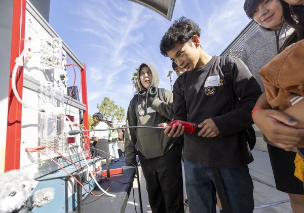 student with controller at H2 station MESA