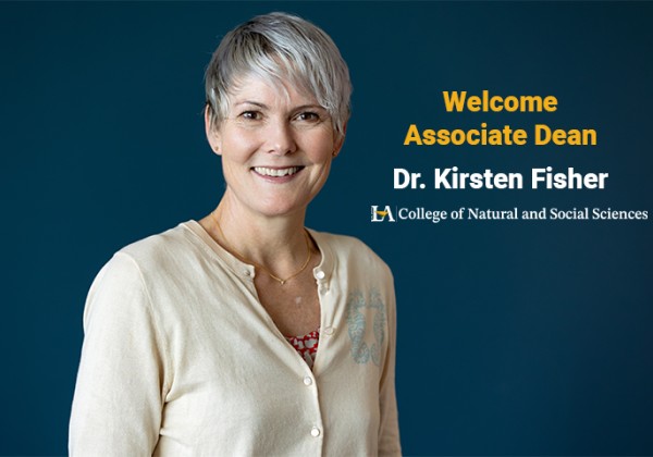 Dr. Fisher wearing a white blouse