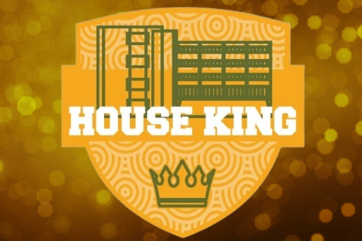 A yellow colored shield with magenta designs inscribed within. The text reads: "House King". A yellow background accompanies the graphic.