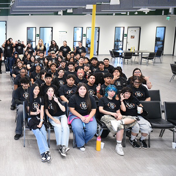 A large group of students seated and facing forward.