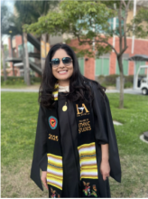 Katherine wearing black graduation regalia
