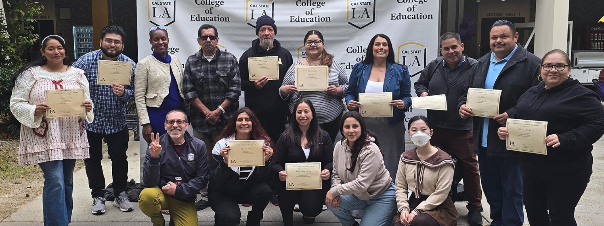 Group of dean's list students and faculty posing for picture
